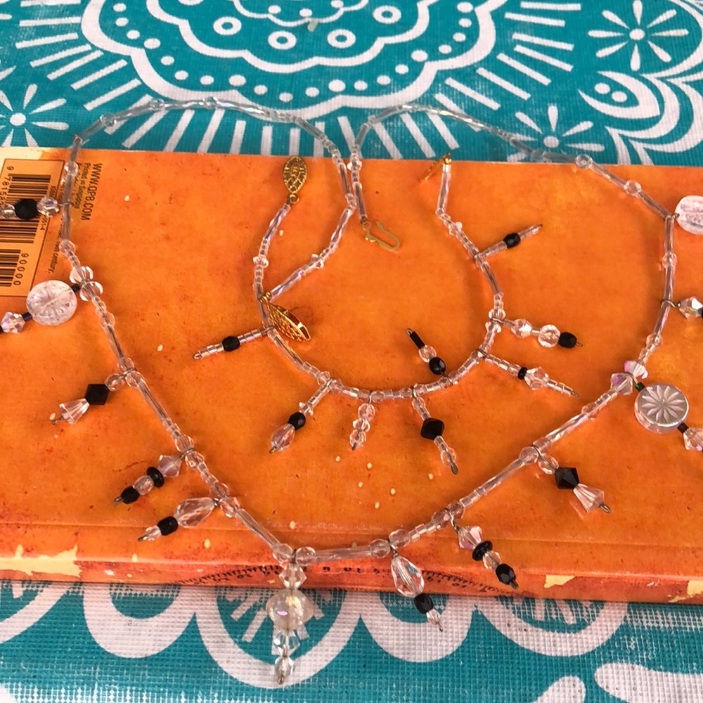 Clear and black stone set with gold lock